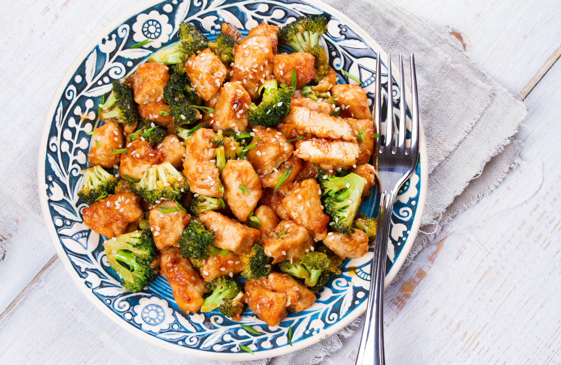 Sesame chicken stir-fry with broccoli and green onions at No 1 Chinese Restaurant in Chesapeake Sesame chicken stir-fry with broccoli and green onions at No 1 Chinese Restaurant in Chesapeake